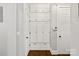 Hallway featuring built-in storage cabinets and drawers in a bright, neutral color palette at 618 Bannerman Ln, Fort Mill, SC 29715