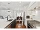 Spacious kitchen features a large island with seating and stainless steel appliances and backsplash at 618 Bannerman Ln, Fort Mill, SC 29715