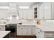 Gourmet kitchen with white subway tile backsplash, quartz countertops, and stainless steel appliances at 618 Bannerman Ln, Fort Mill, SC 29715