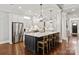 Bright kitchen with stainless steel appliances, a large island, and modern pendant lighting at 618 Bannerman Ln, Fort Mill, SC 29715