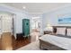 Light-filled bedroom with en-suite bathroom access and view of built-in storage at 618 Bannerman Ln, Fort Mill, SC 29715