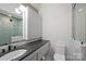 Bathroom featuring modern vanity, gray countertops, and glass enclosed shower at 6366 Sharon Hills Rd, Charlotte, NC 28210