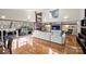 Bright living room with a view to outside deck and featuring hardwood floors and fireplace at 6366 Sharon Hills Rd, Charlotte, NC 28210