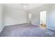 Spacious bedroom featuring carpet flooring and ample natural light at 66 Reed Ne St, Concord, NC 28025