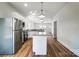 Spacious kitchen with a large island, stainless steel appliances and wood floors at 66 Reed Ne St, Concord, NC 28025