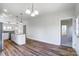 Open concept living area with wood floors at 66 Reed Ne St, Concord, NC 28025