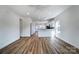 Inviting living space flowing seamlessly into a modern kitchen, ideal for entertaining and everyday living at 66 Reed Ne St, Concord, NC 28025