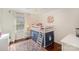 bedroom featuring hardwood floors, a loft bed, and a colorful rug at 7300 Falkirk Pl, Charlotte, NC 28270