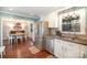 Bright eat-in kitchen with stainless steel appliances, granite countertops, and a large stainless refrigerator at 7300 Falkirk Pl, Charlotte, NC 28270