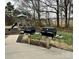 Community grills and playground, ideal for outdoor cooking and entertaining Gathering at 8018 Cotton St, Harrisburg, NC 28075