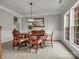 Elegant dining room with classic furniture, neutral walls, and natural light at 809 Circle Trace Rd, Monroe, NC 28110