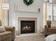 Living room fireplace with decorative mantel and cozy seating at 809 Circle Trace Rd, Monroe, NC 28110