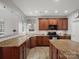 Eat-in kitchen with granite countertops, stainless appliances, and tile flooring at 809 Circle Trace Rd, Monroe, NC 28110