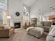 Bright living room with a fireplace, high ceilings, and comfortable seating at 809 Circle Trace Rd, Monroe, NC 28110