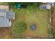 Aerial view of the property showcasing a spacious yard with a trampoline at 8721 Brampton Dr, Charlotte, NC 28215