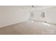 Spacious bedroom with plush carpet and two windows allowing natural light at 9036 Saint Thomas Ln, Charlotte, NC 28277