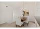 Cozy dining area featuring a modern chandelier and comfortable seating at 9036 Saint Thomas Ln, Charlotte, NC 28277