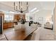 Open concept living with kitchen, dining, and living areas flowing seamlessly at 9036 Saint Thomas Ln, Charlotte, NC 28277
