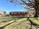 Fenced backyard with mature tree at 911 Union Ter, Gastonia, NC 28056