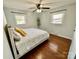 Bedroom with hardwood floors, neutral paint and two bright, sunny windows at 911 Union Ter, Gastonia, NC 28056