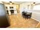 Bright kitchen with stainless steel appliances, white cabinets, and a dining area for Gathering meals at 911 Union Ter, Gastonia, NC 28056