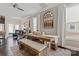 Dining area with a rustic wooden table, bench seating, and an arched window at 919 Pennington Dr, Indian Land, SC 29720