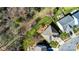 Aerial view of home featuring a large yard with mature landscaping and a patio at 10436 Cullen Ct, Charlotte, NC 28278