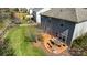 Aerial view of backyard with patio dining set; landscaped yard bordered with a wood fence at 10436 Cullen Ct, Charlotte, NC 28278