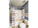 Bright bathroom features a shower and tub combination with a white toilet and neutral shower curtain at 10436 Cullen Ct, Charlotte, NC 28278