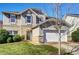 Attractive two-story house boasts a manicured lawn and attached two-car garage at 10436 Cullen Ct, Charlotte, NC 28278