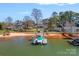 Lakefront home featuring a private dock and scenic views at 106 Beachview Dr, Mooresville, NC 28117