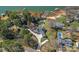 Picturesque lakefront residence surrounded by lush greenery and featuring a private swimming pool at 106 Beachview Dr, Mooresville, NC 28117