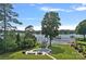 Expansive backyard with a pool, patio, and lake access with private dock at 106 Beachview Dr, Mooresville, NC 28117