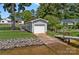 Charming boat house with a roll up garage door and a gentle slope down to the water at 106 Beachview Dr, Mooresville, NC 28117