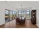 Elegant dining room with views of the lake, ample seating, and access to a patio at 106 Beachview Dr, Mooresville, NC 28117