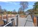 Dock featuring cable railings, nice views, and sandy area at 106 Beachview Dr, Mooresville, NC 28117