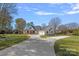 Beautiful home with large driveway, well manicured lawn and professional landscaping at 106 Beachview Dr, Mooresville, NC 28117