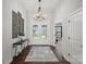 Elegant foyer with high ceilings, double doors and chandelier lighting at 106 Beachview Dr, Mooresville, NC 28117