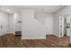 Hallway with wood-look floors and plenty of natural light at 106 Beachview Dr, Mooresville, NC 28117