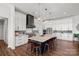 Open kitchen with a large center island, custom cabinets and stainless appliances at 106 Beachview Dr, Mooresville, NC 28117