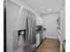 Modern kitchen featuring stainless steel appliances, wooden floors and neutral cabinets at 106 Beachview Dr, Mooresville, NC 28117