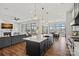 Stunning open kitchen and living area with large windows offering great natural light and outdoor views at 106 Beachview Dr, Mooresville, NC 28117