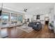 Expansive living room with views of the lake and open access to the kitchen at 106 Beachview Dr, Mooresville, NC 28117