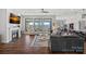 Open-concept living room with views of the water and a seamless flow to the kitchen at 106 Beachview Dr, Mooresville, NC 28117
