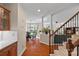 View of the house interior from the stairway showing a dining and living room at 10823 Caverly Ct, Huntersville, NC 28078