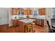 Modern kitchen with white countertops, stainless steel appliances, and a stylish island at 10823 Caverly Ct, Huntersville, NC 28078