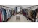 Large walk-in closet with custom shelving, ample storage, and a built-in bench at 10823 Caverly Ct, Huntersville, NC 28078