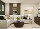 Inviting living room with an oversized couch, decorative pillows, and bright natural light at 109 Dogwood Grove Pl, Troutman, NC 28166