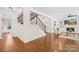 Foyer shows staircase, fireplace, and seamless flow to other rooms at 113 Sandy Cove Ct, Mooresville, NC 28117