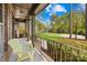 View from the front porch showcasing professional landscaping and a well-manicured lawn at 113 Sandy Cove Ct, Mooresville, NC 28117